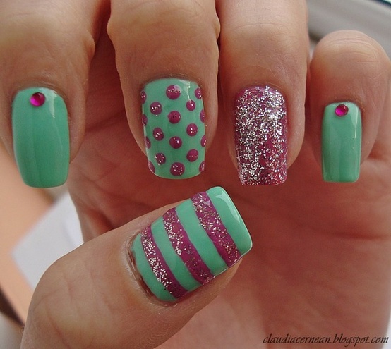 Cute nail design in pastel colors.