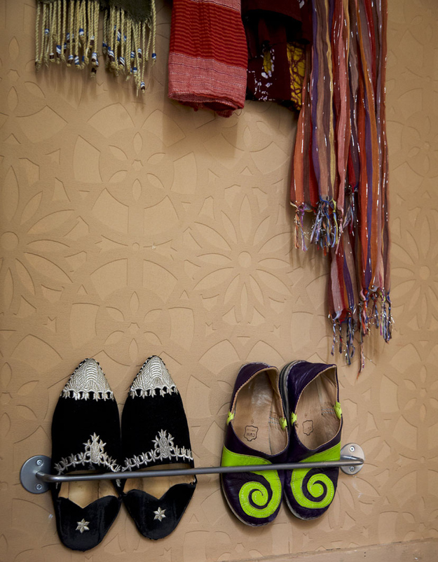 Use towel rails to hold shoes.