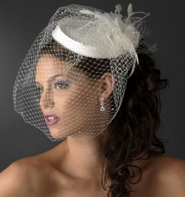 Traditional curl bridal hairstyle with hat