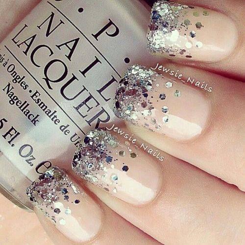Glitter-Nails.-A-nice-glamorous-look-to-go-with-that-white-dress-with-chrome-steel-jewelry.