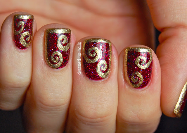 fancy-karina-half-frame-gold-swirl-nail-art-in-red-color