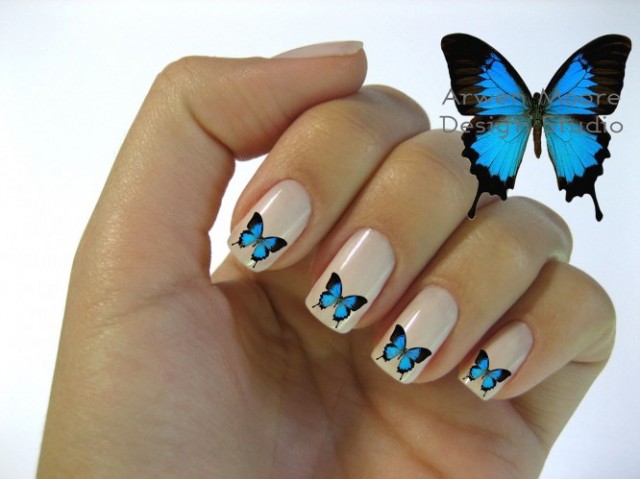 nail-art-designs-beautiful-mod-butterfly-nail-art-waterslide-inspiration-2013-loveliness-style-butterfly-nail-art-666x499