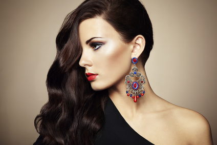 Portrait of beautiful brunette woman in black dress